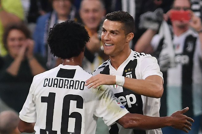 Cristiano Ronaldo (levo Juan Cuadrado) je stroj za doseganje golov. Enega je prispeval tudi med zadnjo tekmo Juventusa v serie A.