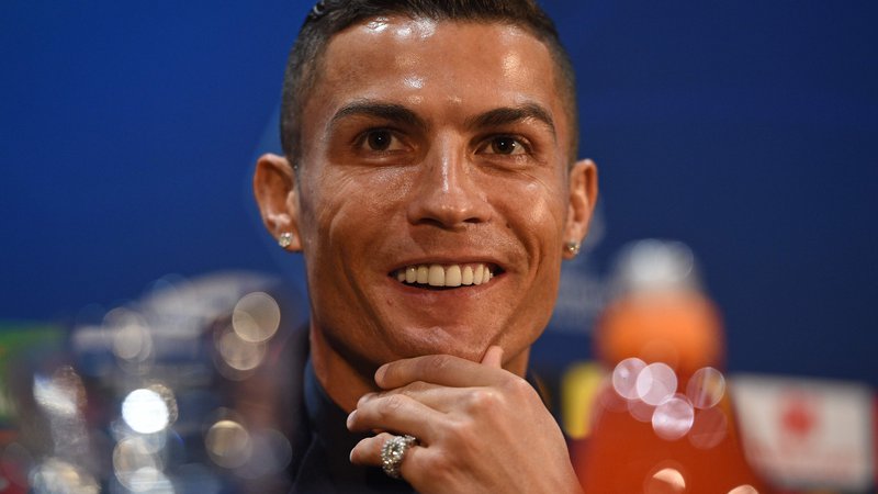 Fotografija: Cristiano Ronaldo je na novinarski konferenci večkrat poudaril, da je srečen človek. FOTO: AFP