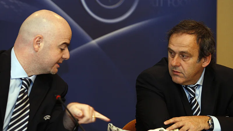 Fotografija: Gianni Infantino (levo) in Michel Platini sta tarči hudih obtožb. FOTO: Reuters