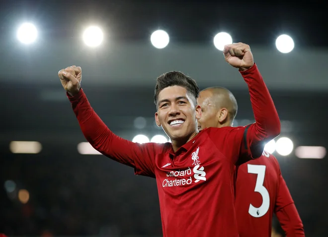 Roberto Firmino je zabil tri gole za zmago Liverpoola nad Arsenalom. FOTO: Reuters<br />
 