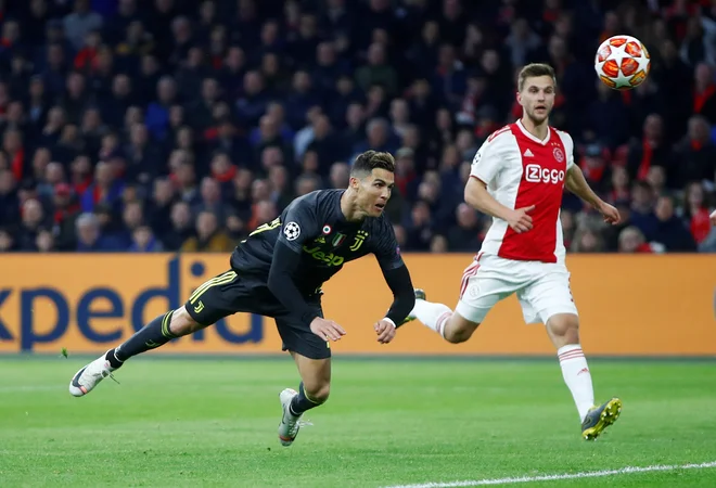 Akcijo Cristiana Ronalda za redko viden gol bi naključni gledalci težko pripisali 34-letniku. FOTO: Reuters