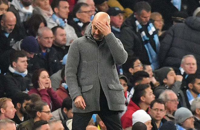 Pep Guardiola je po angleškem dvoboju delno opozoril tudi na sodnike in tehnologijo VAR. FOTO: AFP