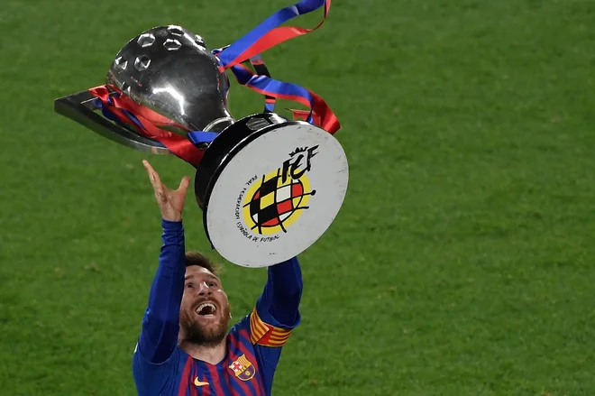 Lionel Messi je dvignil špansko lovoriko in preusmeril misli na spopad z Liverpoolom. FOTO: AFP