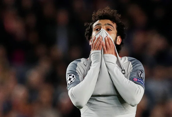 Mohamed Salah je upravičeno obžaloval zapravljeno priložnost iz drugega polčasa, ko je z bližine zadel le vratnico. FOTO: REUTERS