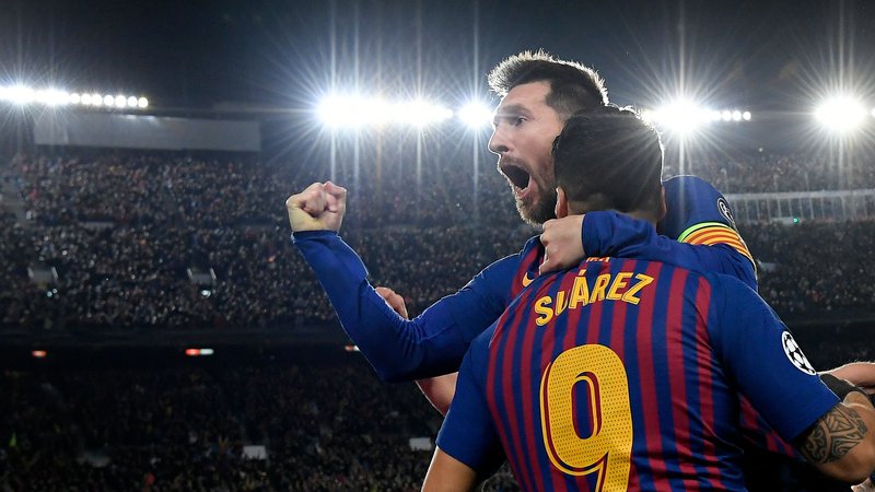 Fotografija: Liverpool sta preluknjala odlična napadalca in velika prijatelja Lionel Messi in Luis Suarez. FOTO: AFP