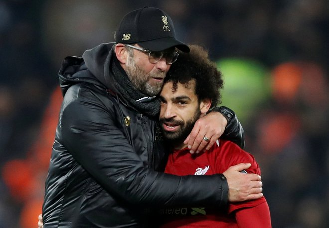 Trener Jürgen Klopp in njegov prvi as Mohamed Salah bosta glavna aduta navijačev Liverpoola, ki v Angliji preživljajo sušo vse od leta 1990. FOTO: Reuters