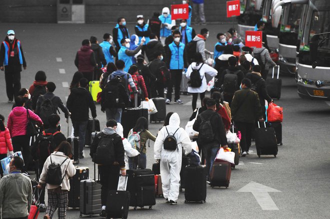 Kdaj se bodo kitajski turisti odpravili na pot po vsem svetu, je odvisno predvsem od tega, kdaj bodo druge države zanje odprle svoje meje. FOTO: Greg Baker/AFP