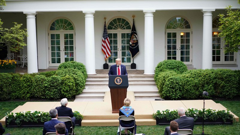 Fotografija: Ameriški predsednik Donald Trump med torkovo tiskovno konferenco. FOTO: Mandel Ngan/AFP