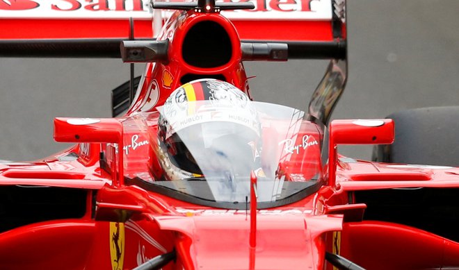Tekmovati za Ferrari je za slehernega dirkača v formuli 1 posebna čast. FOTO;: Reuterd