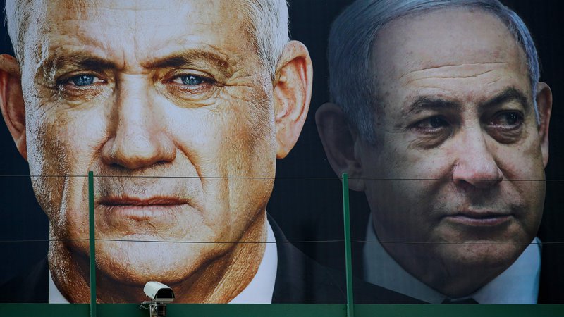 Fotografija: Beni Ganca in Benjamin Netanjahu. FOTO: Jack Guez/AFP