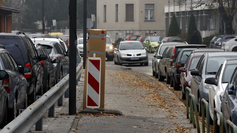 Fotografija: Parmova ulica. FOTO :Blaž Samec/Delo