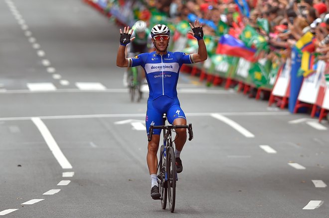 Philippe Gilbert je slavil svojo 10. etapno zmago na tritedenskih dirkah. FOTO: AFP
