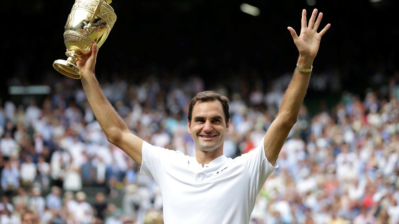 Fotografija: Roger Federer ne osvaja le pokalov, temveč tudi ljudska srca. FOTO: Reuters