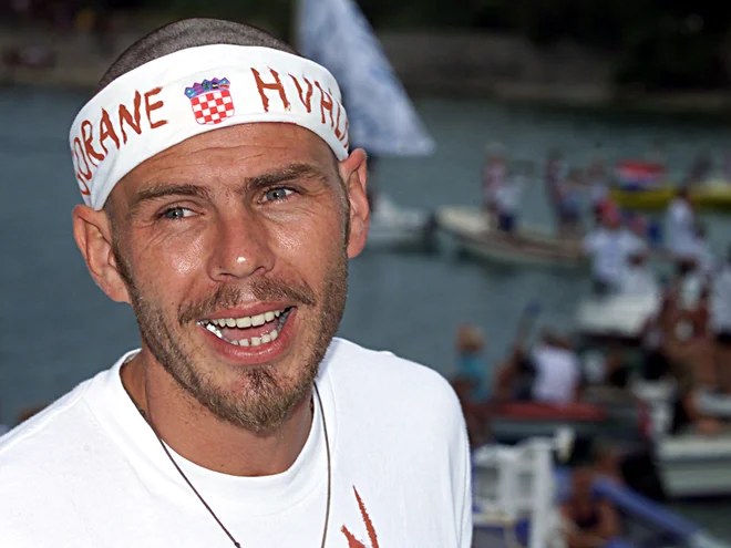 <strong>Zvonimir Boban</strong> nikdar ni skrival patriotizma. Tako vzhičeno je pričakoval <strong>Gorana Ivaniševića</strong> na sprejemu v Splitu, julija 2001, potem ko je slednji osvojil sloviti wimbledonski teniški turnir. FOTO: Reuters