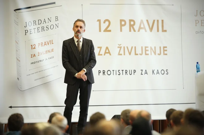 Kaj je moč Petersona? Govori o stvareh, ki so občutljive, a je o njih treba govoriti, je prepričan eden od obiskovalcev predavanja. FOTO: Jure Eržen/Delo