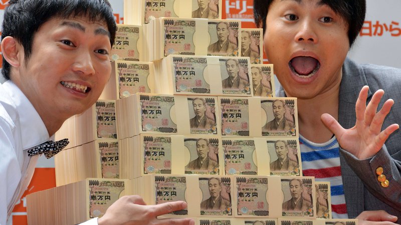 Fotografija: Igre v Tokiu bodo zaradi preložitve še precej dražje. FOTO: AFP