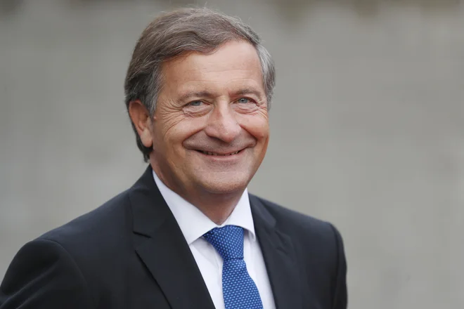 Karl Erjavec, prvak Desusa, je evr poslanca povabil, naj postane član Desusa. FOTO: Leon Vidic/Delo