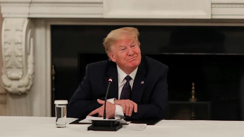 Fotografija: Ameriški predsednik Donald Trump je naznanil, da jemlje sporno zdravilo. FOTO: Leah Millis/Reuters