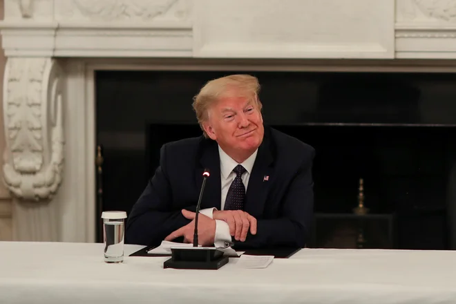 Ameriški predsednik&nbsp;Donald Trump je naznanil, da jemlje sporno zdravilo.&nbsp;FOTO: Leah Millis/Reuters