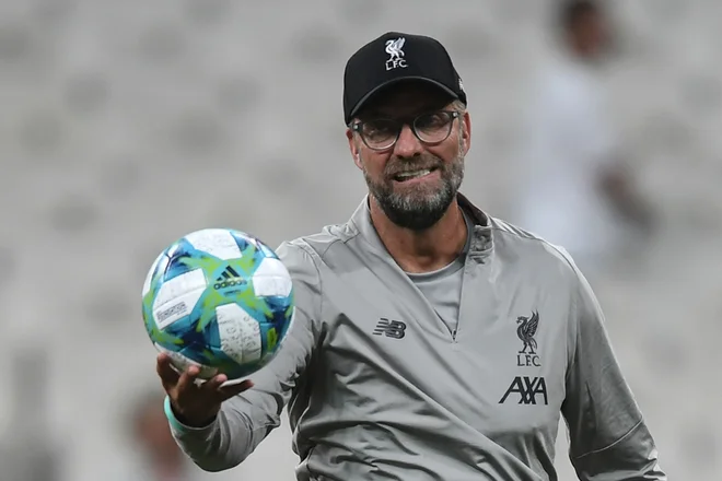Jürgen Klopp je ob vrnitvi svojih nogometašev na skupinske treninge dejal, da igralcev ne namerava ogrožati ali jih postavljati v položaje, ki bi bili zdravstveno tvegani. FOTO: AFP
