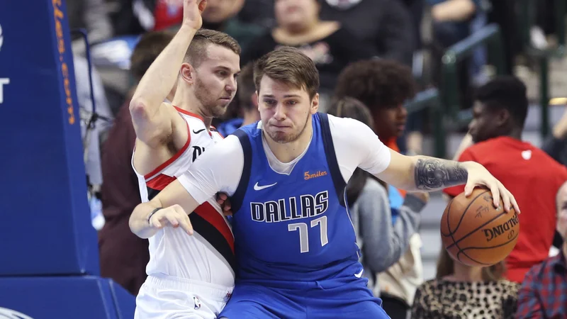 Fotografija: Luka Dončić bo še nosil reprezentančni dres, če bo le zdrav. FOTO: Kevin Jairaj/Reuters