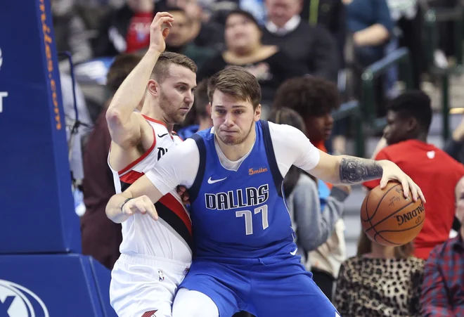 Luka Dončić bo še nosil reprezentančni dres, če bo le zdrav. FOTO: Kevin Jairaj/Reuters