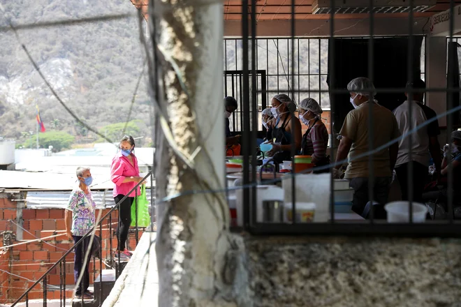 &raquo;Težko je opisati, v kako negotovih razmerah živimo,&laquo; so venezuelski Slovenci zapisali v pismu, ki smo ga pridobili na <em>Delu</em>. Fotografija je simbolična. Foto: Manaure Quintero/Reuters