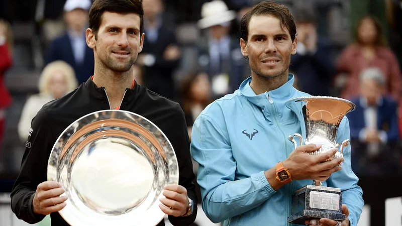 Fotografija: Lani je v finalu rimskega mastersa ATP serije 1000 zmagal Rafael Nadal, ki je premagal Novaka Đokovića s 6:0, 4:6, 6:1. FOTO: AFP