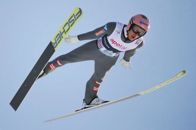 Stefan Kraft se je včeraj razveselil četrte zmage v sezoni in 16. v karieri. FOTO: Reuters