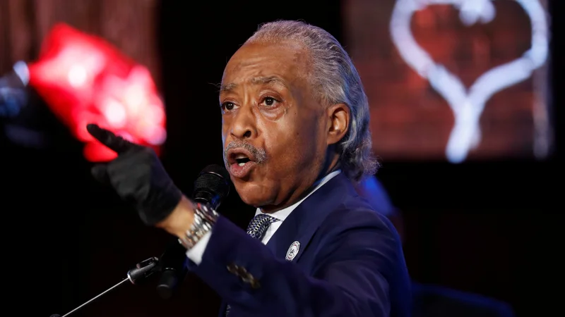 Fotografija: Častiti Al Sharpton je govoril med žalno slovesnosto za pokojnim Georgeem Floydoma v Minneapolisu. FOTO: Lucas Jackson/Reuters