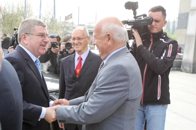 Predsednik Moka Thomas Bach (levo) je izjemno cenil Janeza Kocijančiča (desno), v sredini Miroslav Cerar. FOTO: Marko Feist
