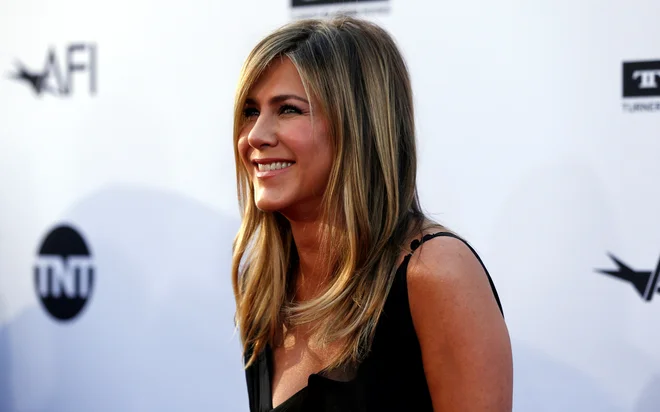 Jennifer Aniston se pogosto znajde v medijih, ko se ugiba, ali je (končno) noseča. FOTO: Mario Anzuoni/Reuters