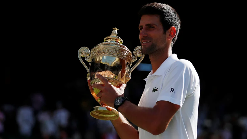 Fotografija: Novak Đoković je v dopoldnevu pred wimbledonsko zmago jedel le sadje in zelenjavo. FOTO: Andrew Boyers/Reuters