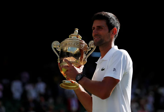 Novak Đoković je v dopoldnevu pred wimbledonsko zmago jedel le sadje in zelenjavo. FOTO: Andrew Boyers/Reuters
