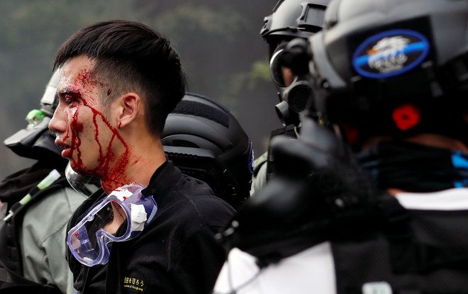 Razmere v Hongkongu niso v ospredju, bolj pomembno je gospodarsko sodelovanje. FOTO: Tyrone Siu/Reuters