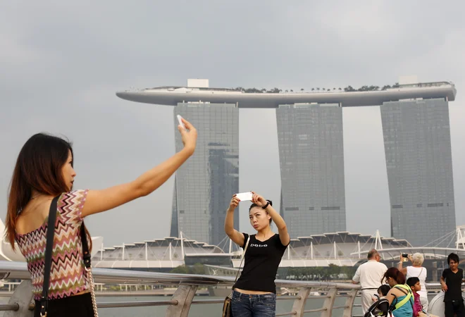 Na vrhu lestvice konkurenčnosti IMD je, tako kot lani, Singapur. FOTO: Edgar Su/Reuters