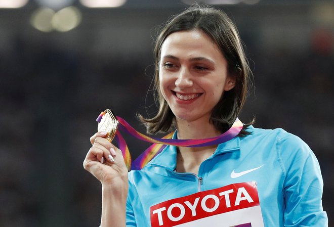 Svetovna prvakinja v skoku v višino Maria Lasickene je bila med ruskimi atleti in atletinjami, ki so krovno organizacijo pozvali naj plačajo kazen. FOTO: Reuters