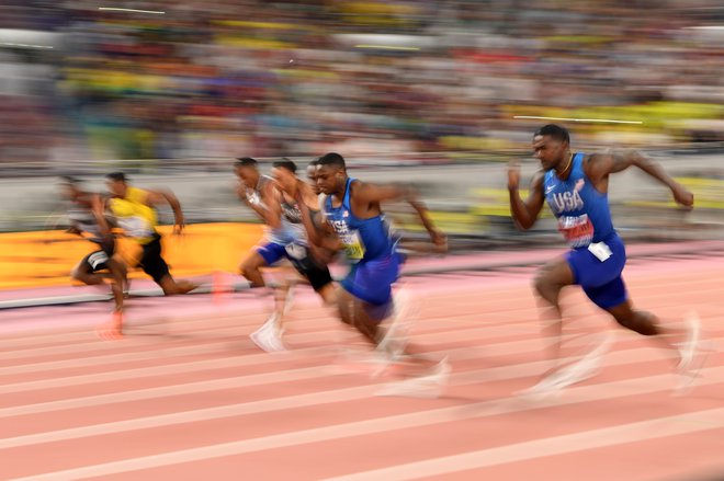 Prizor iz finala teka na sto metrov z lanskega svetovnega prvenstva v Dohi, ki je pripadel Chrisu Colemanu. FOTO: Kirill Kudryavtsev/AFP