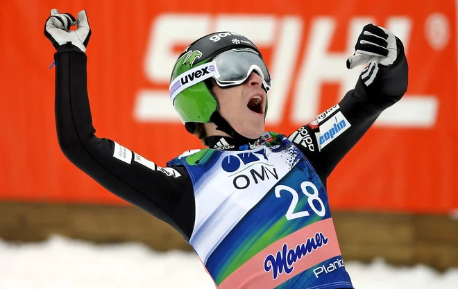 Jurij Tepeš se je takole marca 2015 veselil popolnega poleta in zmage v Planici. FOTO: Matej Družnik