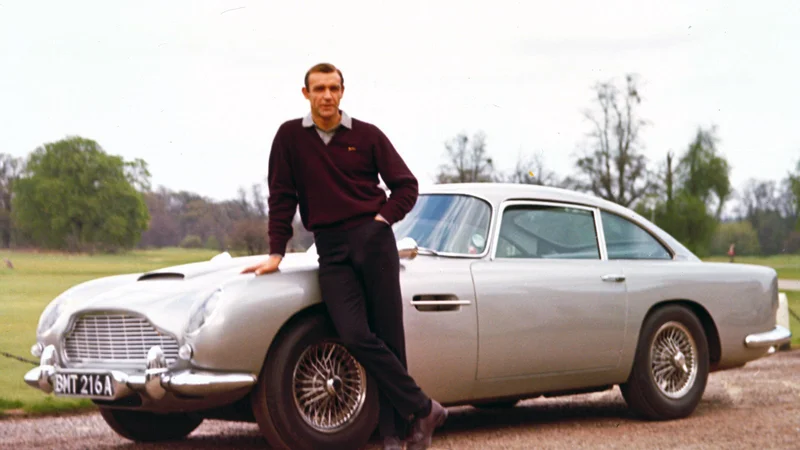 Fotografija:
Aston martin DB5 in Sean Connery v vlogi Jamesa Bonda sta zaslovela leta 1964 v filmu Goldfinger. Foto Aston Martin