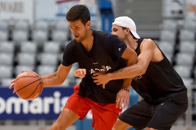 Novak Đokovic in Grigor Dimitrov sta oba okužena. FOTO: AFP