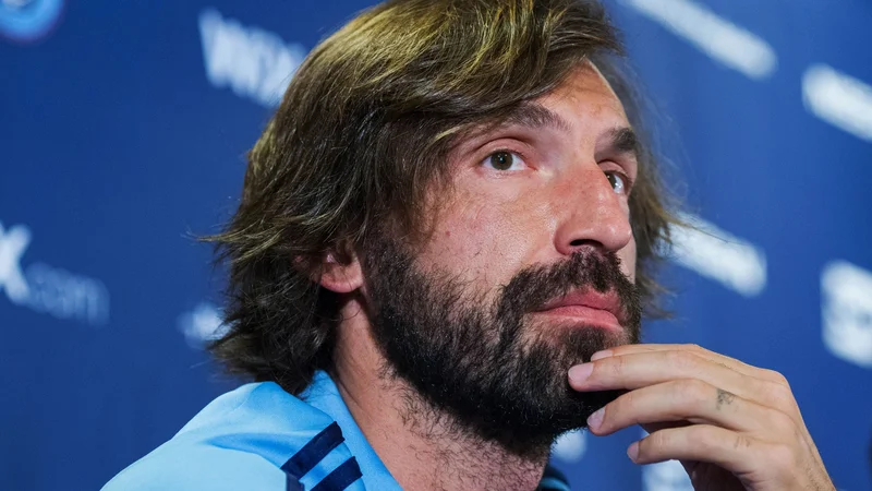 Fotografija: Andrea Pirlo bo s svojimi bogatimi izkušnjami pomagal Juventusu. FOTO: Eduardo Munoz Alvarez/AFP