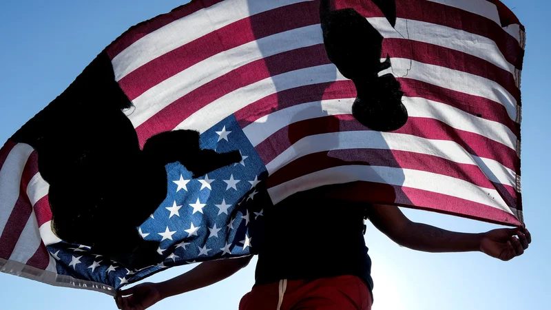 Fotografija: Američani so v ideološkem viharju. FOTO: Ringo Chiu/Reuters