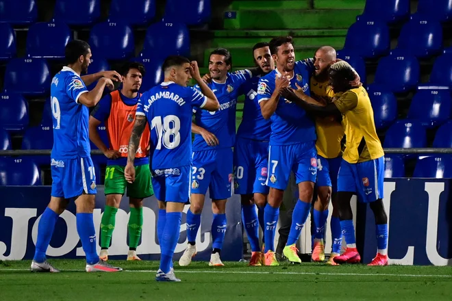 Nogometaši Getafeja (na fotografiji) so pogosto trd oreh za Realove ase. FOTO: Javier Soriano/AFP