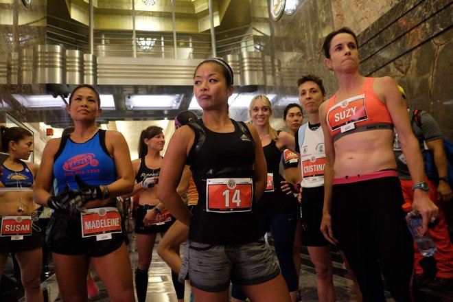Runners get ready at the start line before the 38th Annual Empire State Building Run-Up in New York on February 4, 2015. Racing up 86 floors, 1,576 steps, and 1,050 feet from the lobby to the iconic 86th floor Observatory, 220 participants from around the