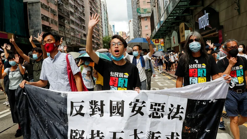 Fotografija: Hongkong me je vedno spominjal na dober cirkus, ker je v njem vladala disciplinirana hrabrost. FOTO: Tyrone Siu/Reuters