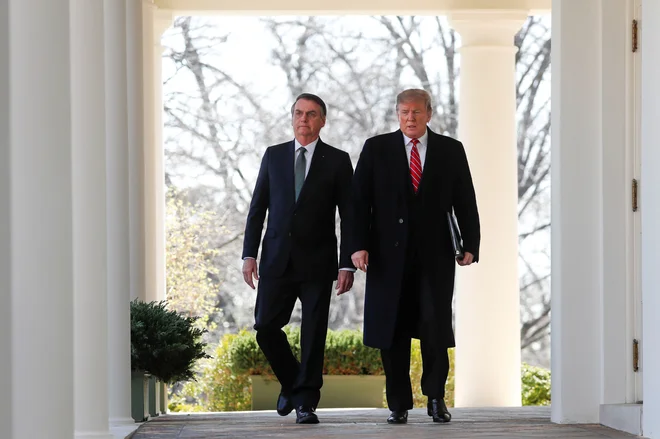 Trump in Bolsonaro­ sta hitro obsodila­ ­venezuelski režim ­Nicolása Madura. FOTO: Carlos Barria/Reuters