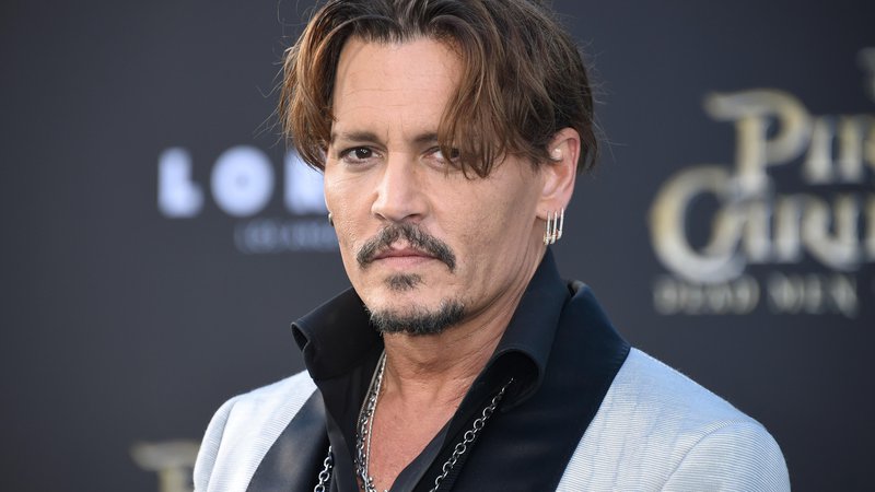 Fotografija: Johnny Depp na premieri filma Pirati s Karibov: Salazarjevo maščevanje. FOTO: Phil Mccarten/Reuters