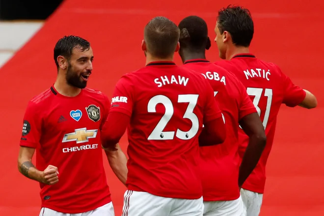 Nogometaši Manchester Uniteda so osvojili pomembne točke na gostovanju pri Aston Villi. FOTO: Clive Brunskill/AFP