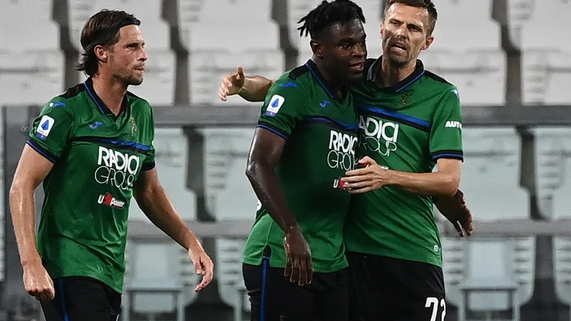 Fotografija: Atalanta je z obilo smole ostala brez zmage v Torinu, kjer je eno uro igral tudi slovenski zvezdnik Josip Iličić (desno). FOTO: Marco Bertorello/AFP